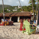 beach at bolongo bay with colorful chairs