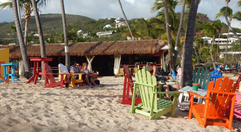 beach at bolongo bay with colorful chairs
