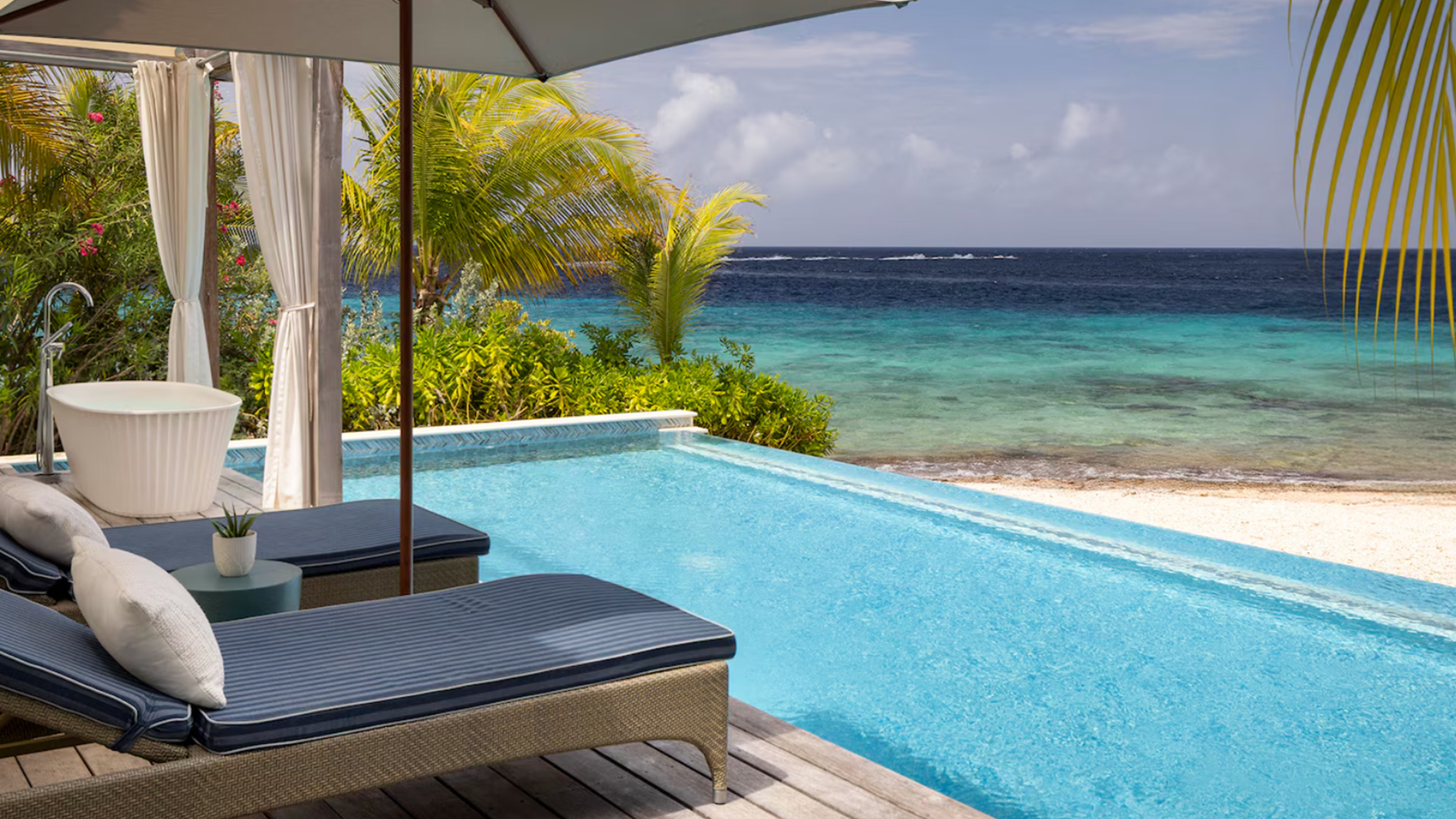 This Caribbean All-Inclusive Has Bungalows Right Next to the Water, a Two-Level Infinity Pool, and Swim-Up Suites