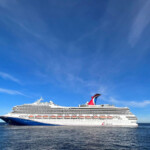 carnival radiance cruise ship on the water