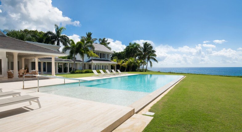 villa at casa de campo with pool and beach in background