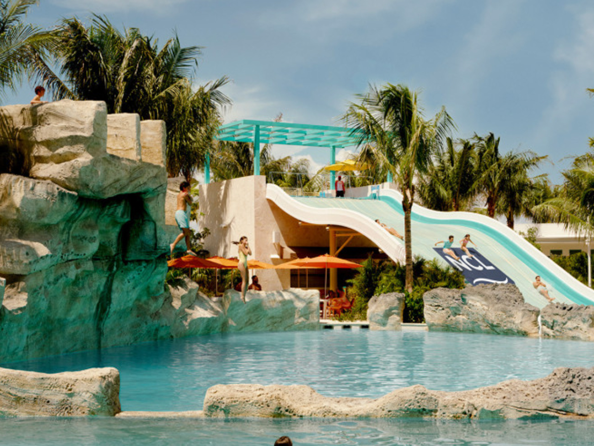 Norwegian Cruise Line Just Gave the First Look at Its New Bahamas Waterpark, With a Six-Acre River, Cliff Jumps, and the Caribbean’s Only Four-Person Body Slide