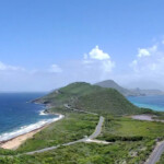 green hills on southeast peninsula with road winding through