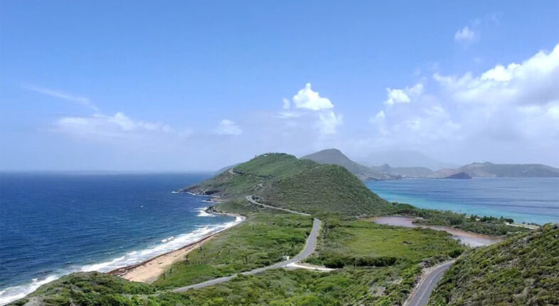 green hills on southeast peninsula with road winding through