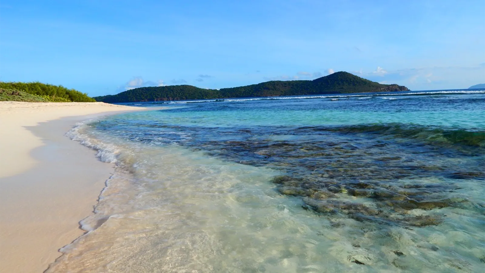 This St. Thomas Beach Has White Sand, Sparkling Turquoise Water and a View We Never Get Tired Of